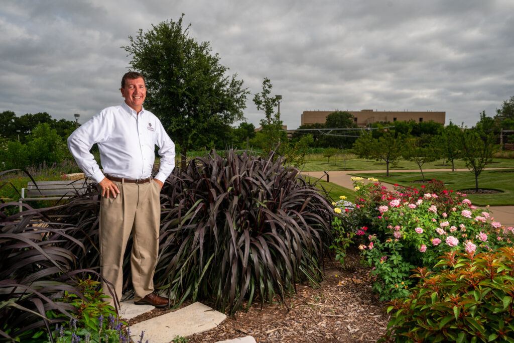 Joseph Johnson poses outside in The Gardens